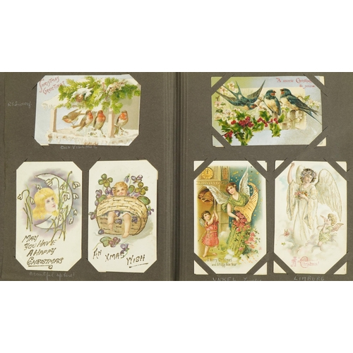 2244 - Collection of Edwardian and later greetings cards arranged in two albums