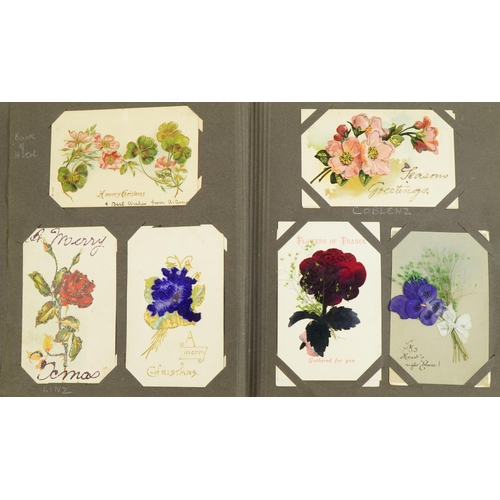 2244 - Collection of Edwardian and later greetings cards arranged in two albums