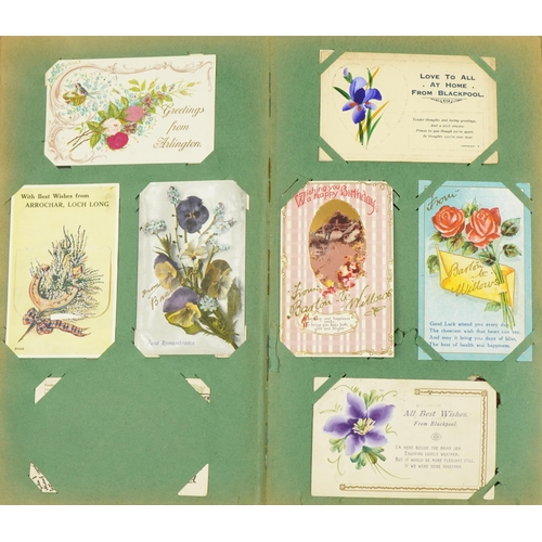 2244 - Collection of Edwardian and later greetings cards arranged in two albums