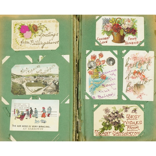 2244 - Collection of Edwardian and later greetings cards arranged in two albums