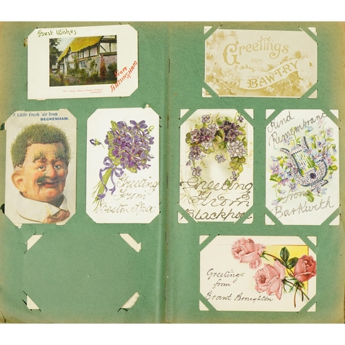 2244 - Collection of Edwardian and later greetings cards arranged in two albums