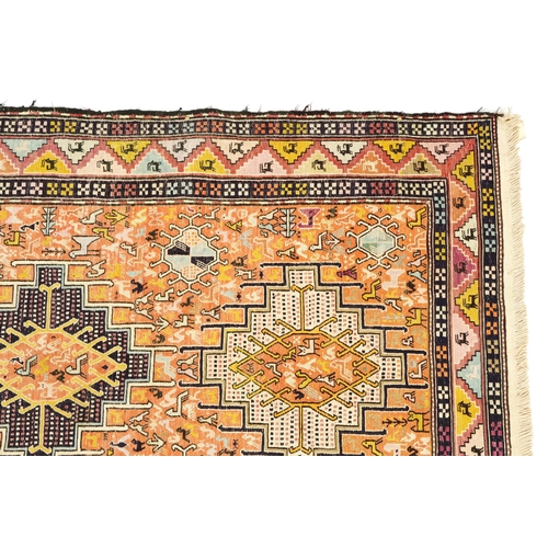 1112 - Rectangular Turkish rug with allover geometric and animal design, 200cm x 114cm