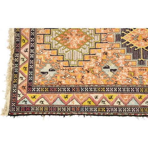 1112 - Rectangular Turkish rug with allover geometric and animal design, 200cm x 114cm