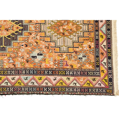 1112 - Rectangular Turkish rug with allover geometric and animal design, 200cm x 114cm