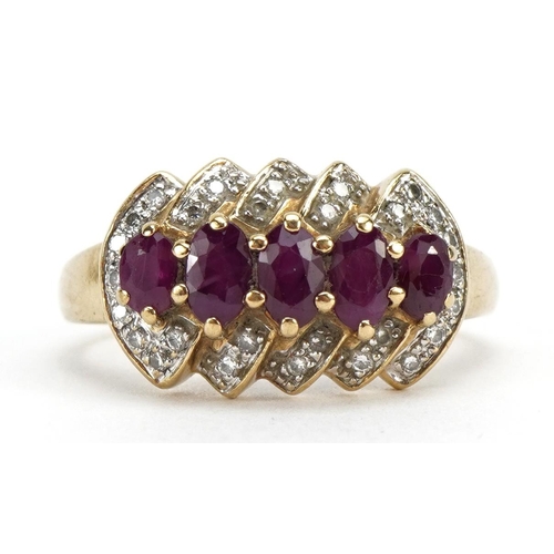 3014 - 9ct gold ruby and diamond cluster ring, size Q, 3.2g