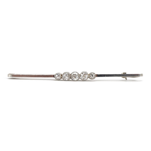 3027 - 18ct white gold and platinum diamond five stone bar brooch housed in a Mappin & Webb tooled leather ... 