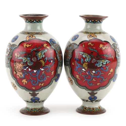 245A - Pair of Japanese cloisonne vases enamelled with mythical birds and flowers, each 16cm high