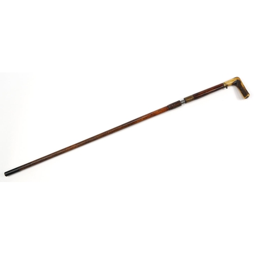 341 - Dumonthier Patent walking stick shot gun with antler horn handle, 87cm in length