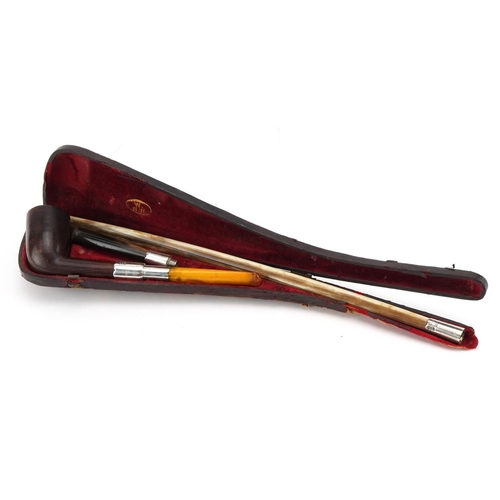 110 - Victorian four piece silver mounted smoking pipe with amber coloured mouthpiece housed in a fitted t... 