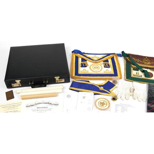 329 - Masonic regalia including sashes, enamelled jewels and coins