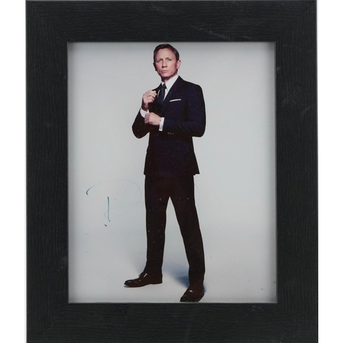 2481 - Two James Bond interest Daniel Craig photographs including Spectre and one signed in ink by the acto... 