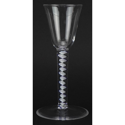 64 - Eighteenth century wine glass with multi coloured opaque twist stem, 15.5cm high