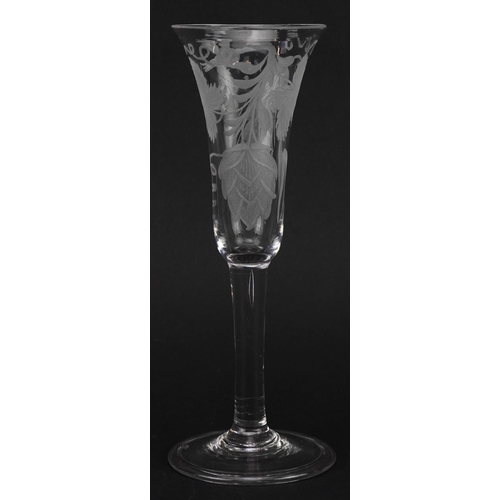 65 - Eighteenth century ale glass with folded foot etched with leaves, 19.5cm high