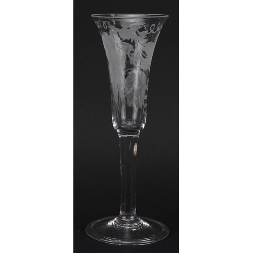 65 - Eighteenth century ale glass with folded foot etched with leaves, 19.5cm high