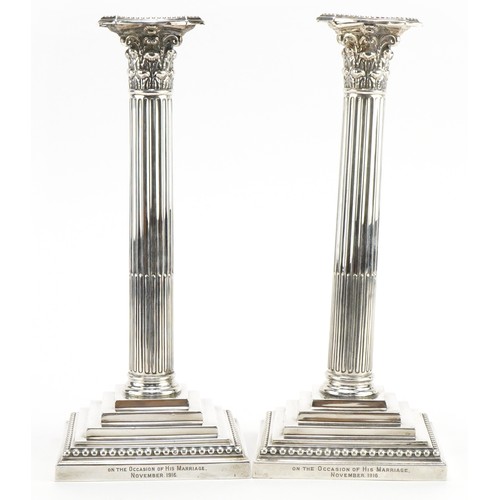 184 - William Hutton & Sons Ltd, pair of Edwardian military interest silver Corinthian column candlesticks... 