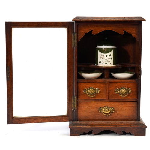 212 - Art Nouveau oak smoker's cabinet with hand gilded porcelain tobacco jar and dishes, 44cm H x 26.5cm ... 