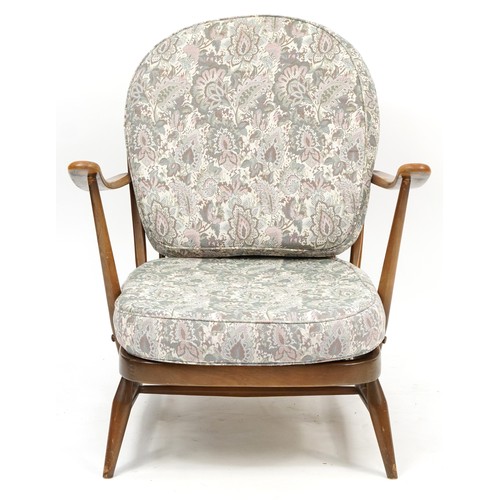 1126 - Ercol Windsor elm and beech armchair with floral lift off cushions, 76cm high