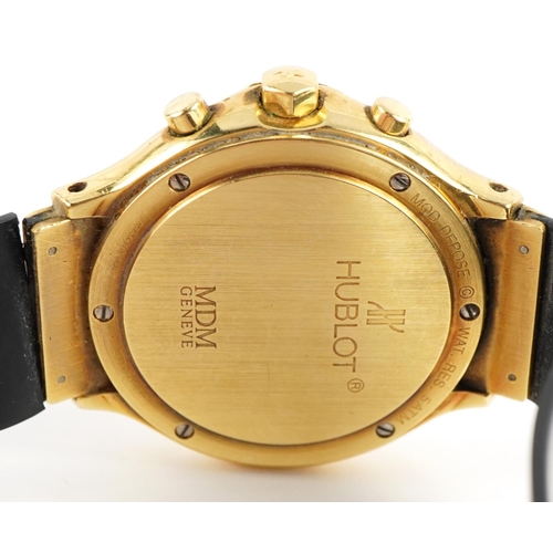3015 - Hublot, 18ct gold Hublot MDM 1620.3 chronograph wristwatch, reference 219128, with black rubber stra... 