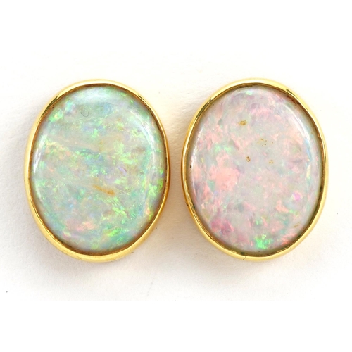 3018 - Pair of unmarked gold opal stud earrings, 1.6cm high, 4.4g