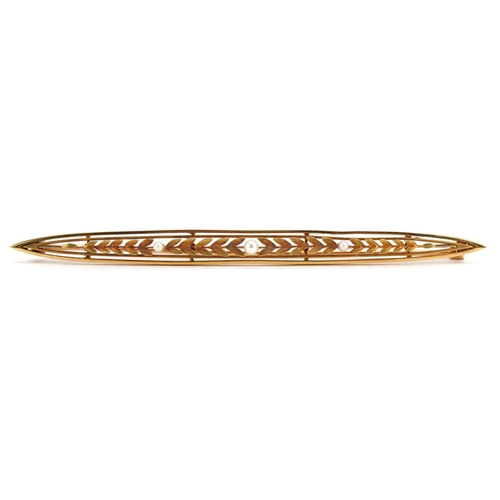 3020 - Unmarked gold leaf design bar brooch set with three seed pearls housed in a Mappin & Webb, London to... 