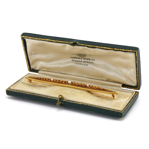 3020 - Unmarked gold leaf design bar brooch set with three seed pearls housed in a Mappin & Webb, London to... 