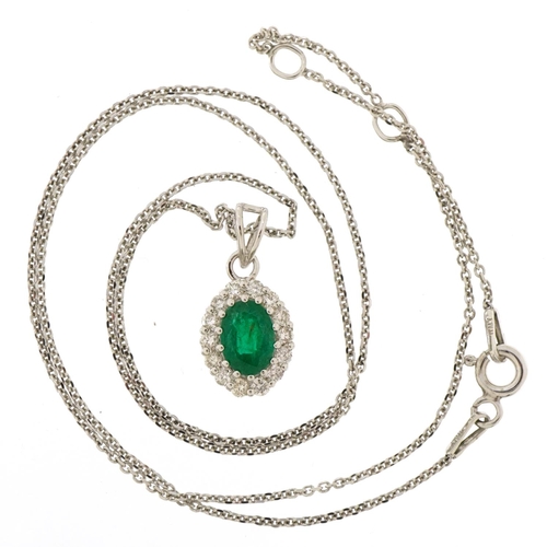 3040 - 18ct white gold emerald and diamond cluster pendant on silver Belcher link necklace, total emerald w... 