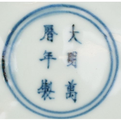 332 - Chinese blue and white porcelain dish hand painted with flowers, six figure character marks to the r... 