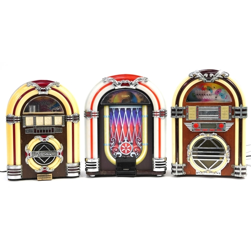 1373 - Three retro juke box style radios, the largest 40.5cm high