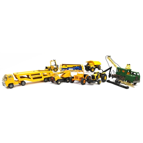 1628 - Eight vintage construction and agricultural vehicles, mostly diecast, including Tonka, Meccano and a... 