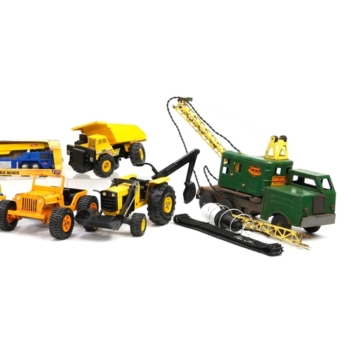 1628 - Eight vintage construction and agricultural vehicles, mostly diecast, including Tonka, Meccano and a... 