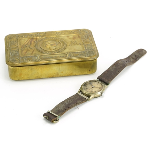 836 - British military World War I brass Mary tin and a military issue wristwatch with screw back impresse... 