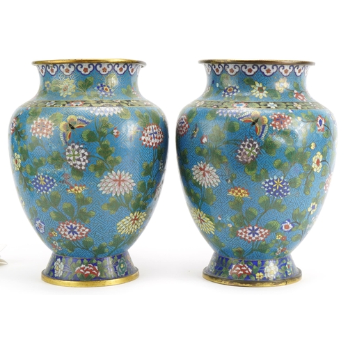 16 - Pair of Chinese cloisonne vases finely enamelled with flowers and foliage, each 28.5cm high