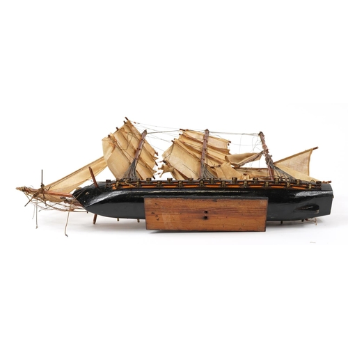 290 - Wooden model of a Napoleonic rigged frigate, 79cm in length