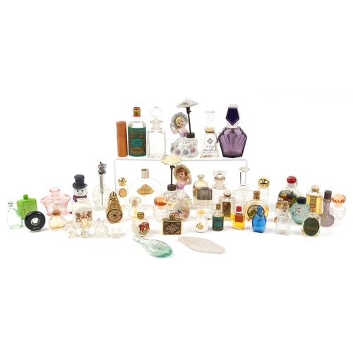 1441 - Vintage and later scent bottles, perfume bottles and atomisers including a pair of Japanese figural ... 