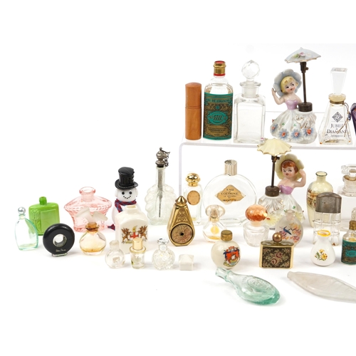 1441 - Vintage and later scent bottles, perfume bottles and atomisers including a pair of Japanese figural ... 