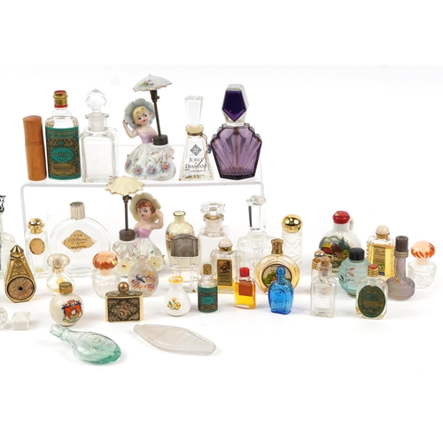 1441 - Vintage and later scent bottles, perfume bottles and atomisers including a pair of Japanese figural ... 