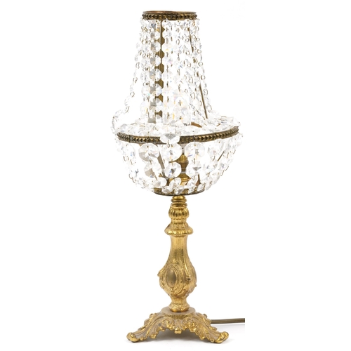 1301 - Ornate gilt metal table lamp with cut glass shade, 43cm high