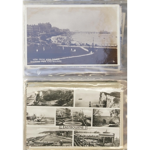 758 - Collection of nearly one hundred Eastbourne postcards arranged in an album including Grand Parade, T... 