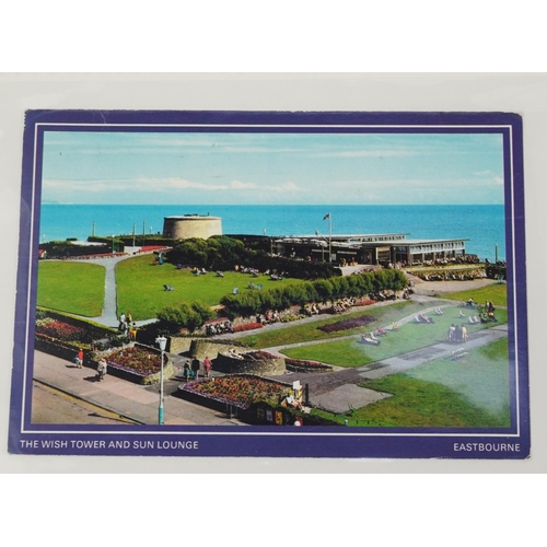 759 - Collection of Eastbourne postcards arranged in two albums including Holywell