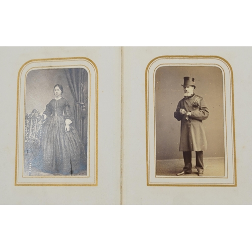 754 - Collection of Victorian photographs, cabinet cards and cartes de visite arranged in three albums inc... 