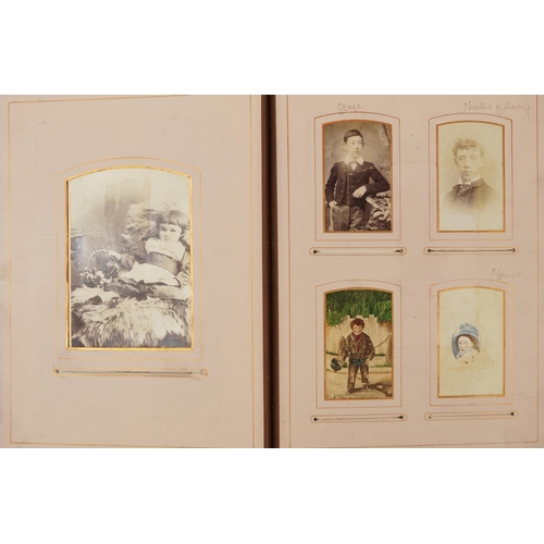 754 - Collection of Victorian photographs, cabinet cards and cartes de visite arranged in three albums inc... 