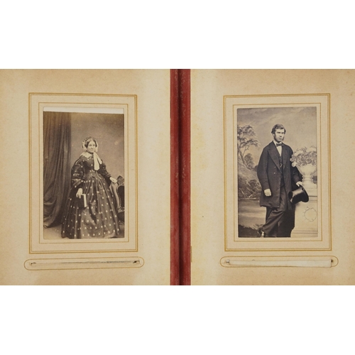 754 - Collection of Victorian photographs, cabinet cards and cartes de visite arranged in three albums inc... 