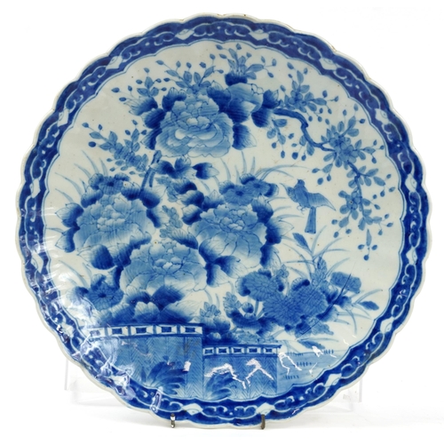 1303 - Japanese blue and white porcelain charger hand painted with bird of paradise amongst flowers, 40cm i... 