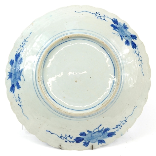 1303 - Japanese blue and white porcelain charger hand painted with bird of paradise amongst flowers, 40cm i... 