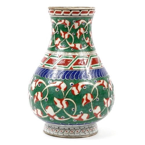 62 - Turkish Ottoman Iznik pottery vase hand painted with flowers, 26.5cm high