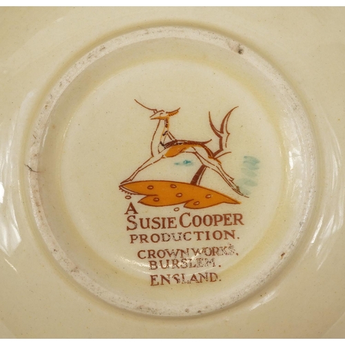 248 - Susie Cooper, Art Deco dinnerware including lidded tureen, plate and graduated meat platters, the la... 