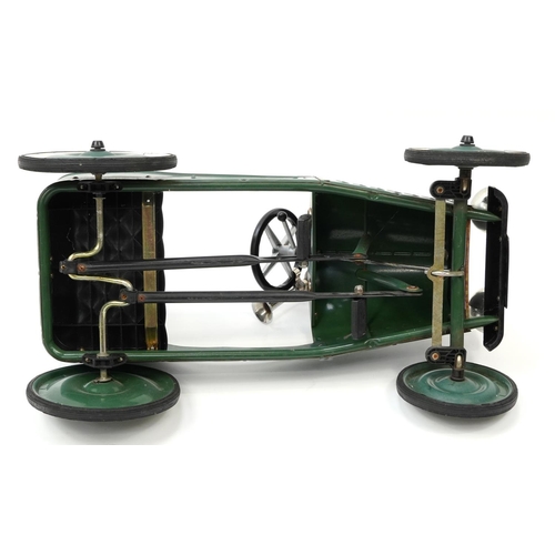 1623 - Vintage green painted metal child's ride-on pedal car, 75cm in length