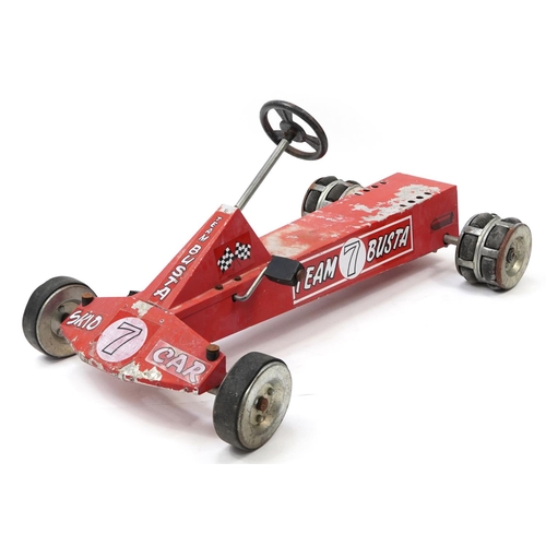 1627 - Vintage metal child's ride-on Team Busta Skid Car pedal car, 115cm in length