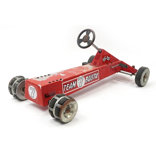 1627 - Vintage metal child's ride-on Team Busta Skid Car pedal car, 115cm in length