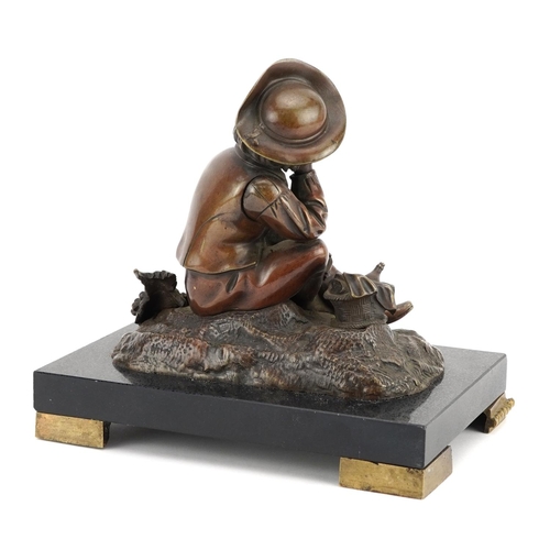 342 - 19th century patinated bronze study of a young farmer raised on a rectangular black slate base with ... 